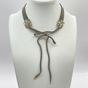 Gray choker style necklace with rhinestones
